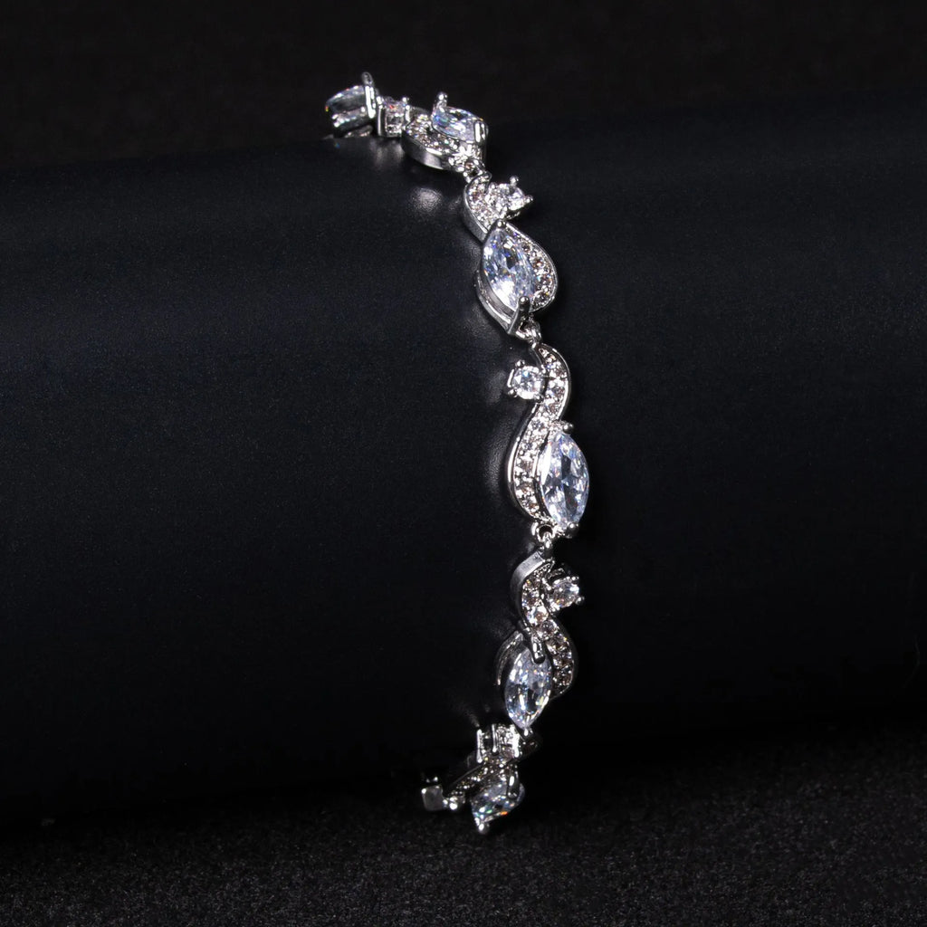 Zircon line bracelet in copper with geometric inlaid design, shown in blue or white for women