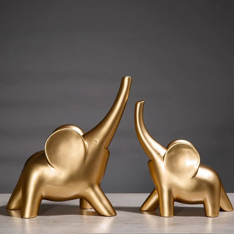 Modern minimalist resin elephant ornament in rose gold or white colour, available in large and small sizes.