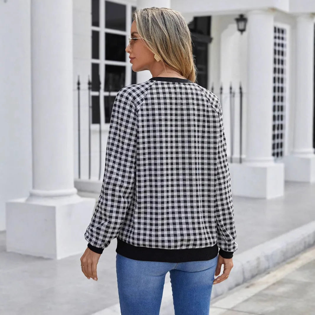 Black long sleeve pullover sweater with a Japanese sweet plaid and striped pattern.