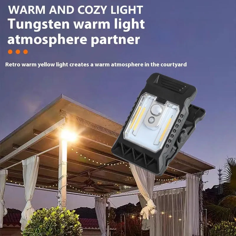 White intelligent induction clip lamp mounted on a wall with motion sensor and LED light visible.