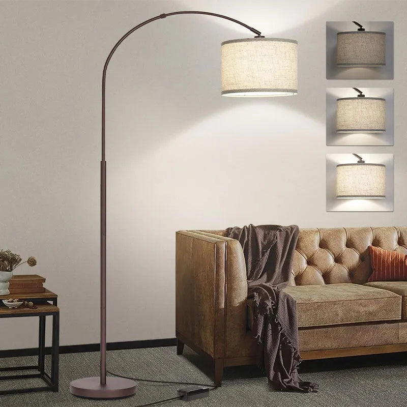 Modern minimalist fishing floor lamp with black fabric shade standing in a living room corner