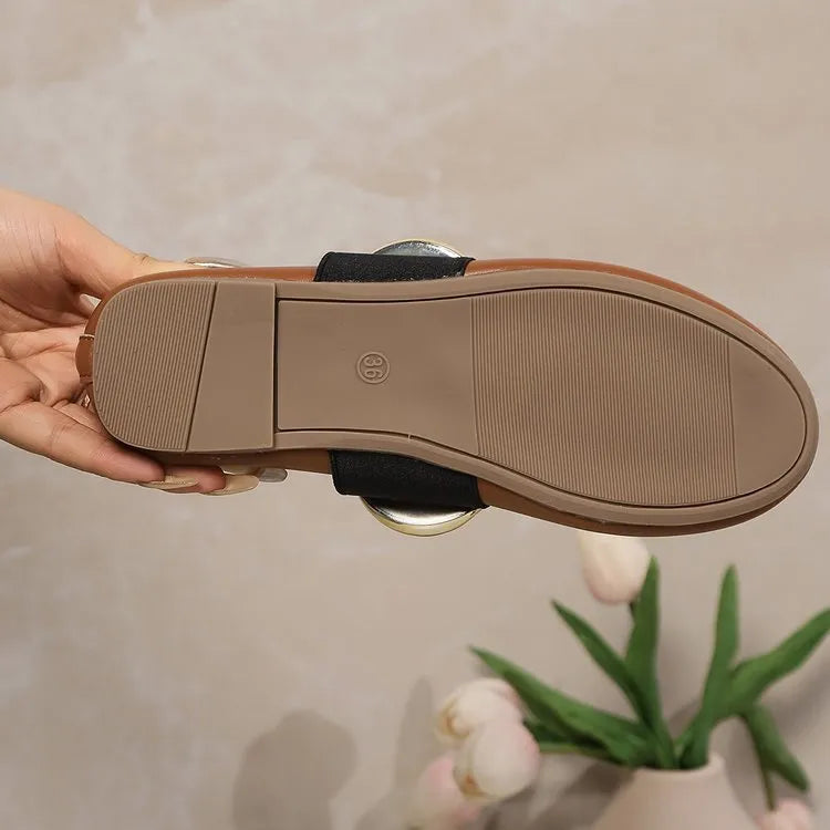 Brown artificial PU flat loafers for women with metal buckle and round toe, side view