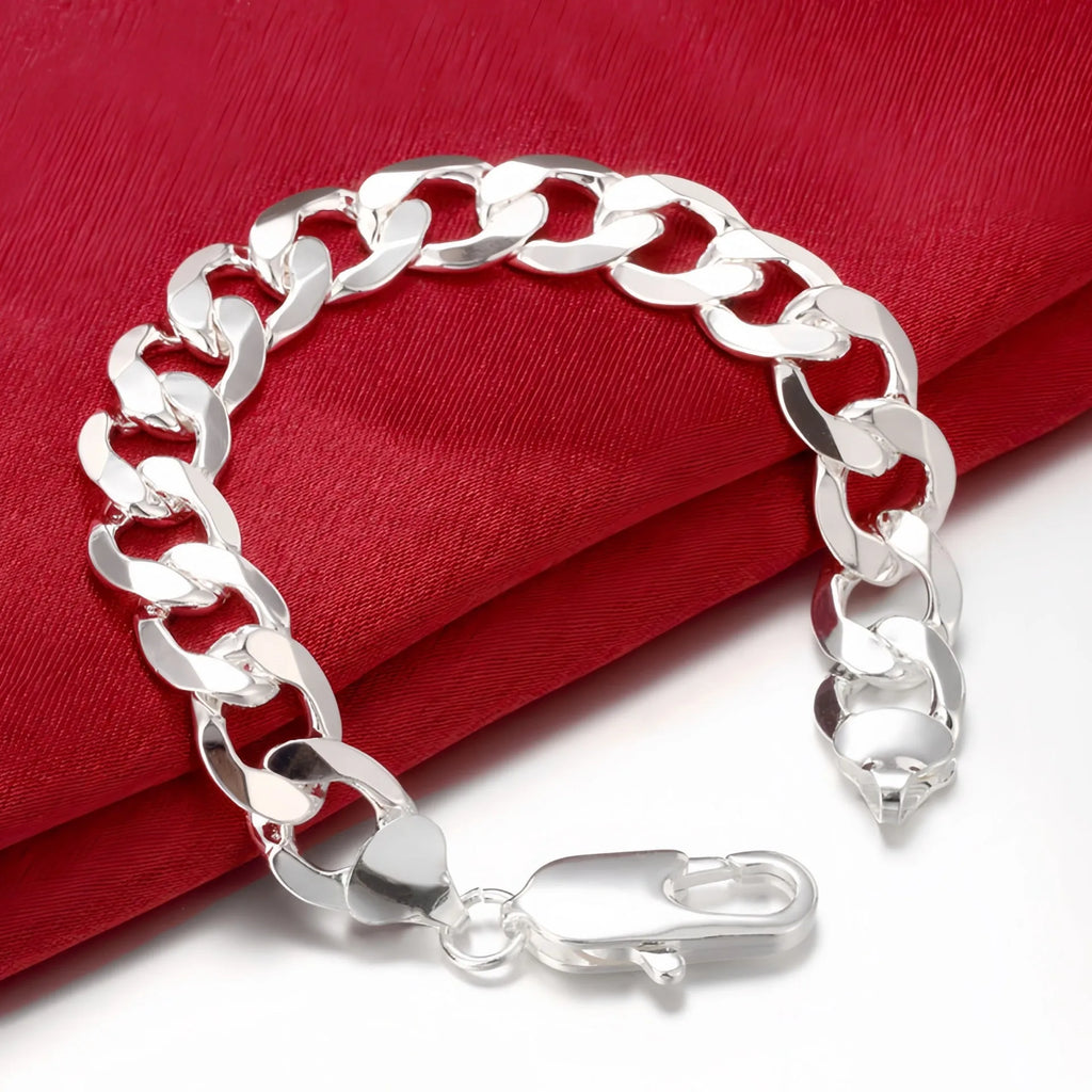 Silver-plated copper geometric bracelet on display, 22cm length, 10mm width, unisex style