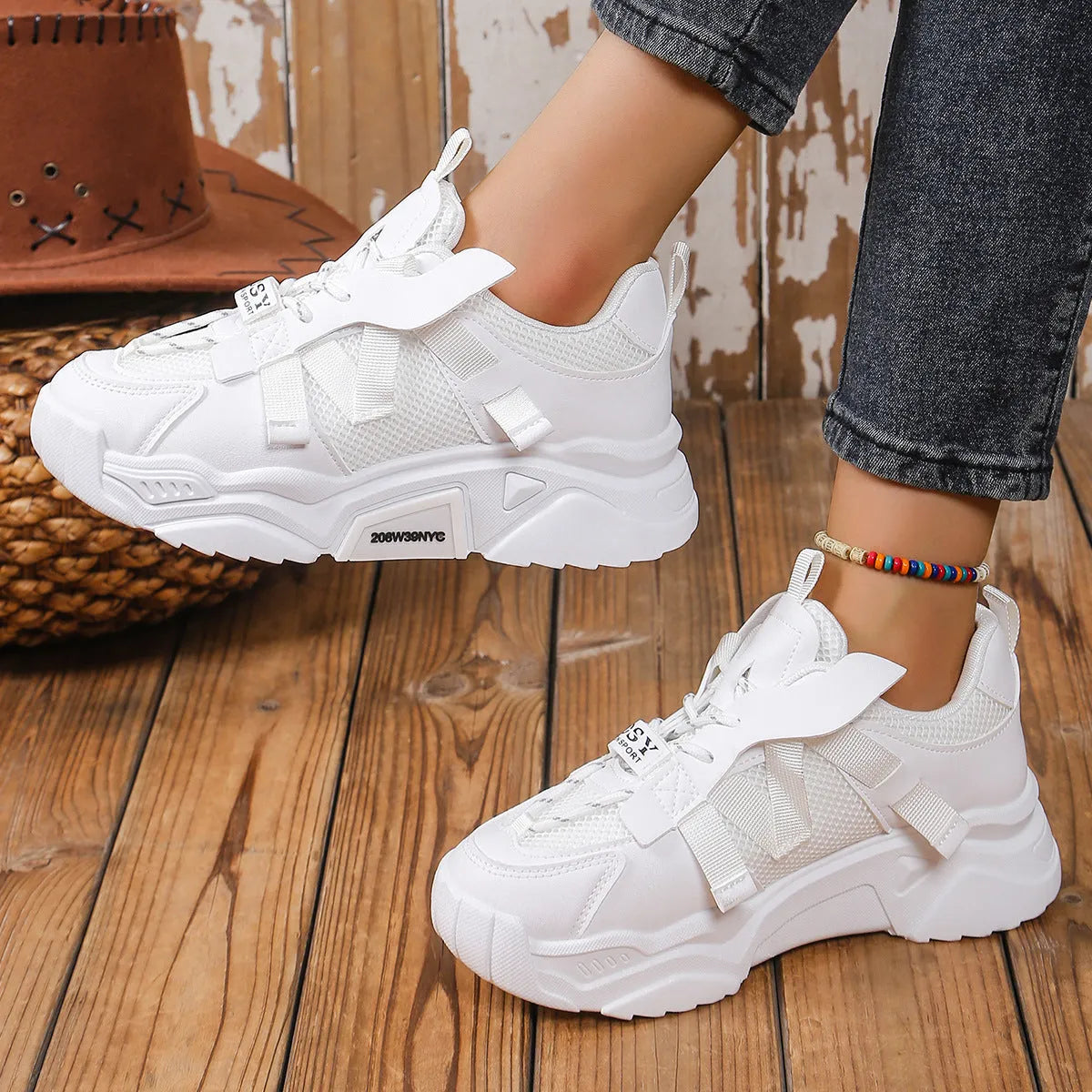 Women's purple green white pink yellow mesh platform sneakers with lace-up front and animal pattern.