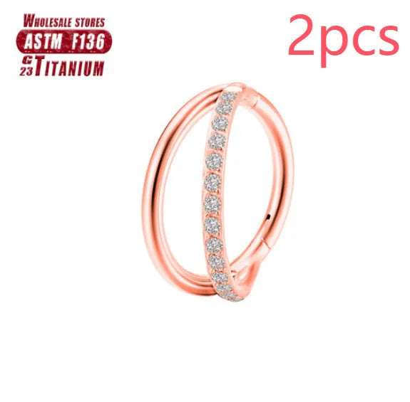Titanium alloy fork nose ring in silver colour on a grey background