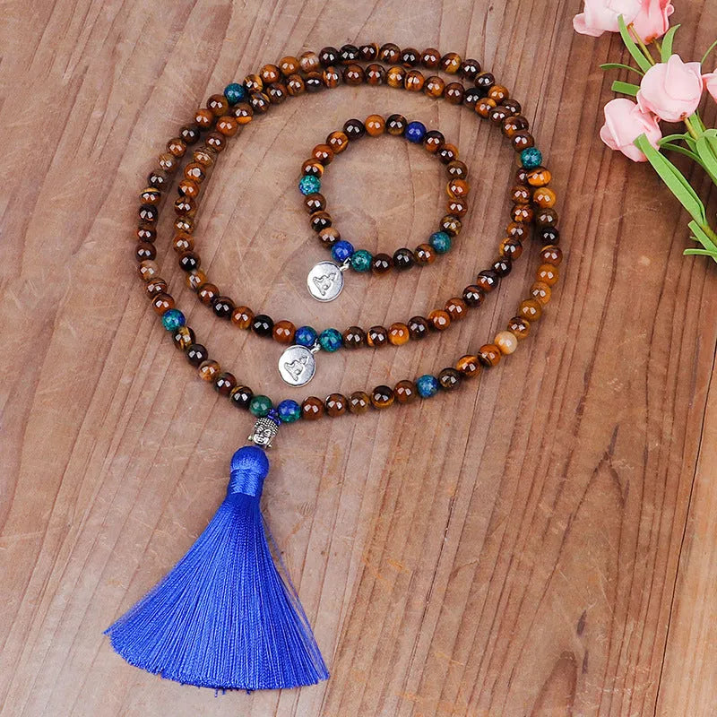 Handmade tiger eye stone bead necklace with Buddha head design, tassel pendant, geometric shape, and 81cm length.