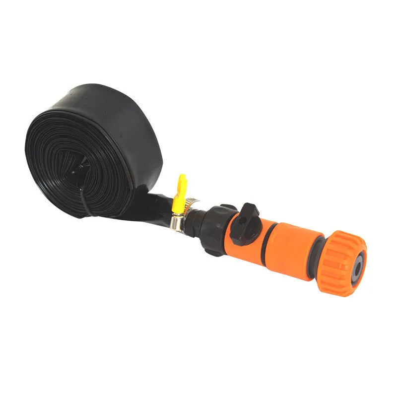 Blue and orange portable PVC garden sprinkler with solar water cooling system on a lawn.