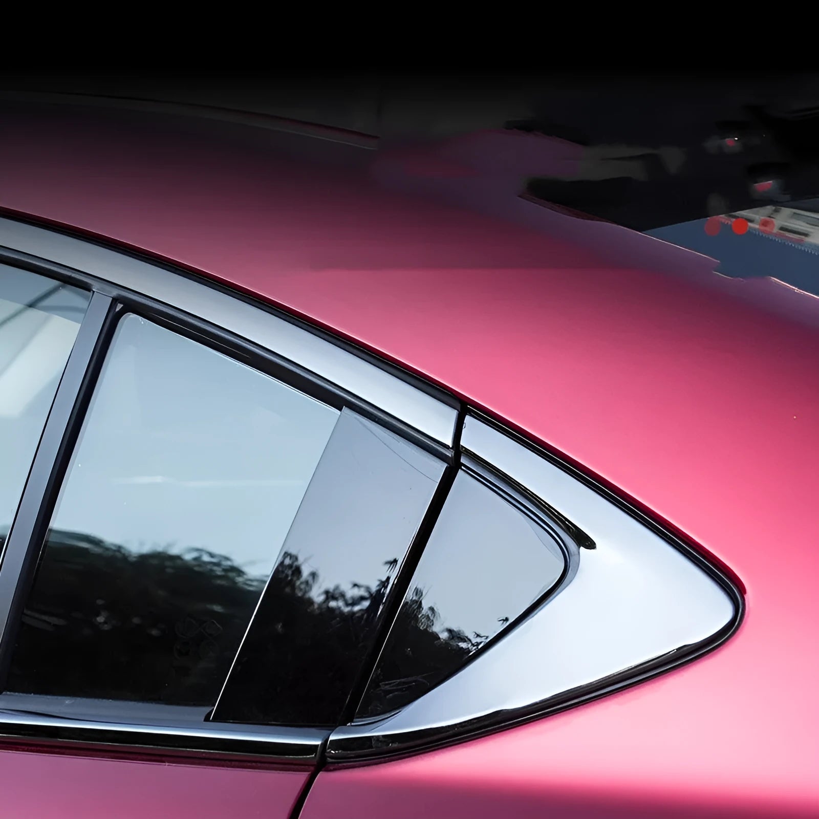 Stainless steel window trim strip with a black titanium brushed satin finish.