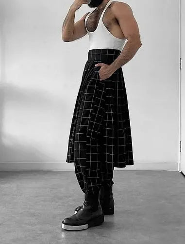 Men's plaid trousers with an apron-style front panel, shown on a model.
