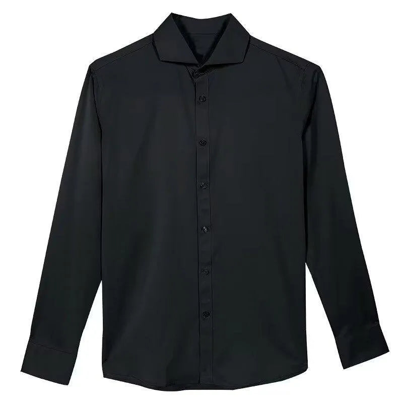 Man wearing a black Japanese retro style loose fit cardigan shirt with long sleeves.