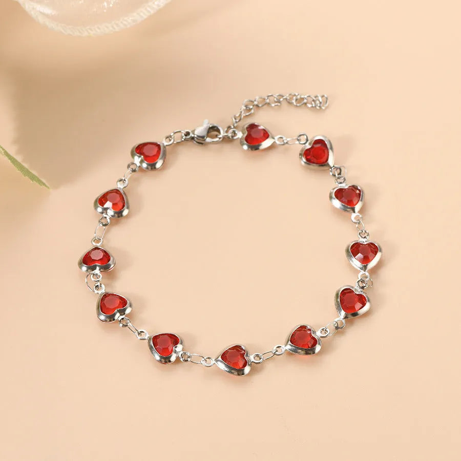 Geometric heart bracelet with colourful electroplated finish on stainless steel, unisex design