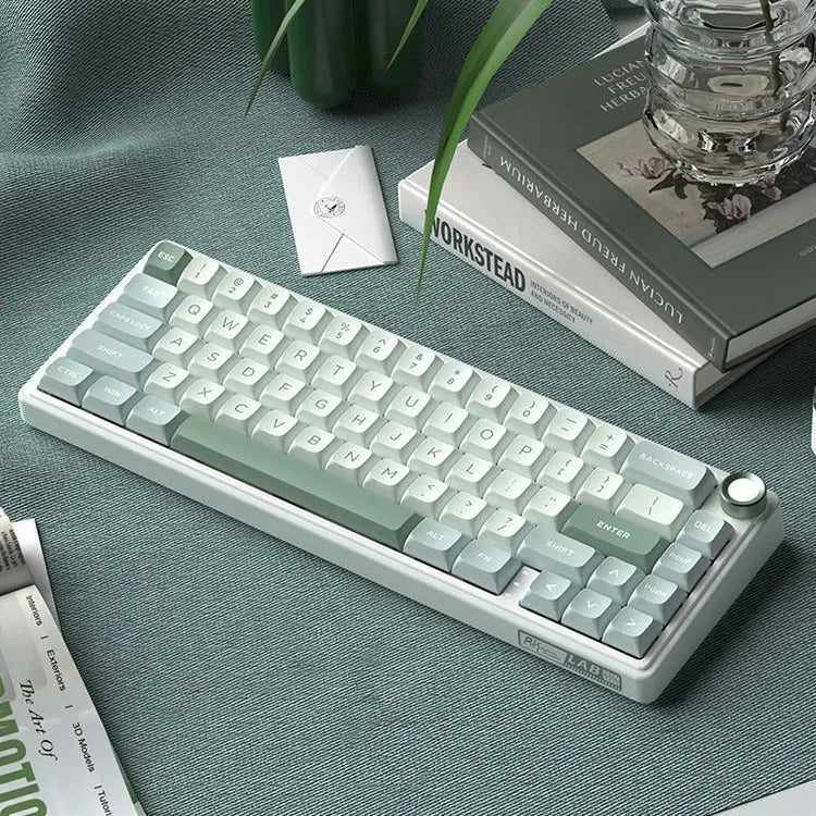 White portable wireless mechanical keyboard with RGB backlighting on a desk