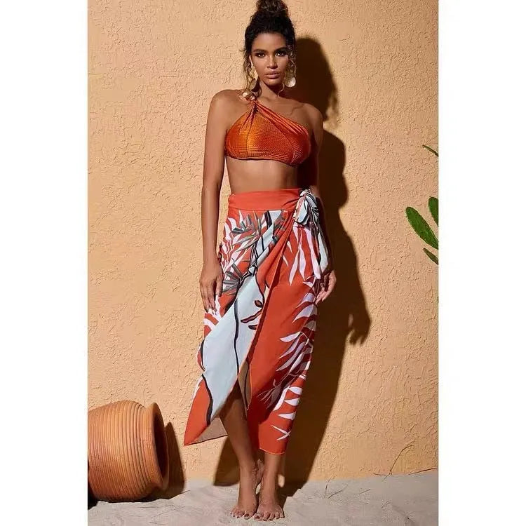 Women's brown high-waist push-up bikini with matching chiffon dress swimsuit set.
