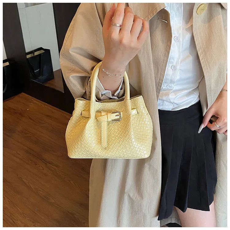 Soft PU bucket messenger handbag for women with spliced exterior and outer pocket, black colour option