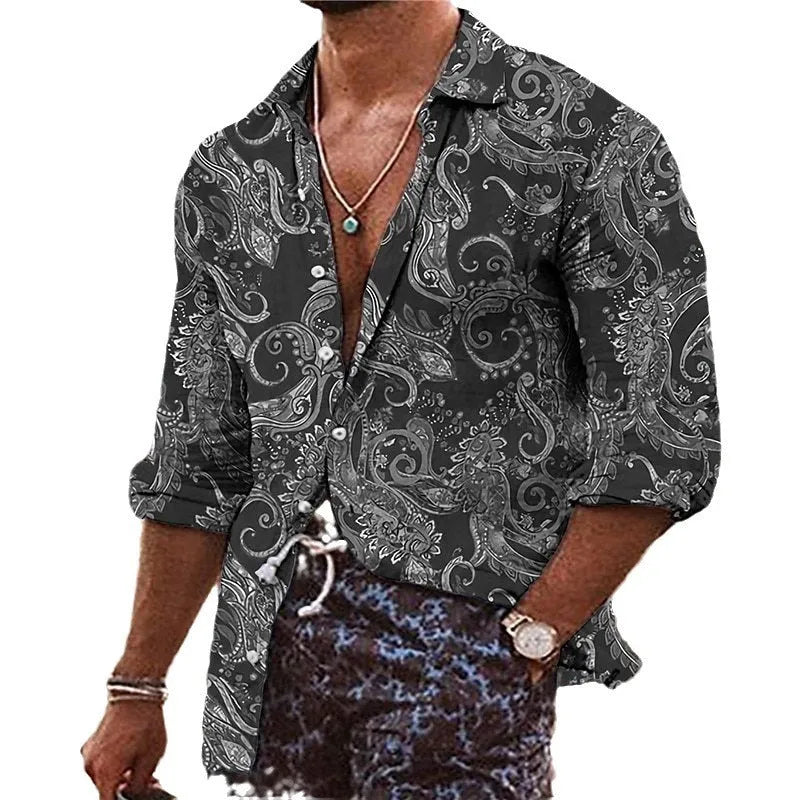 Man wearing a loose-fit long sleeve shirt with a detailed 3D floral print in a bohemian style.
