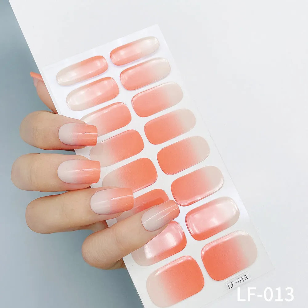 16 solid colour full nail art stickers with 22 patterns including cross, rose, butterfly designs in 12x6mm oval size
