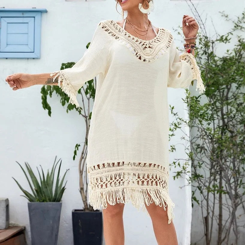 Apricot-coloured women's crocheted patchwork dress with mid-length skirt and half sleeves.