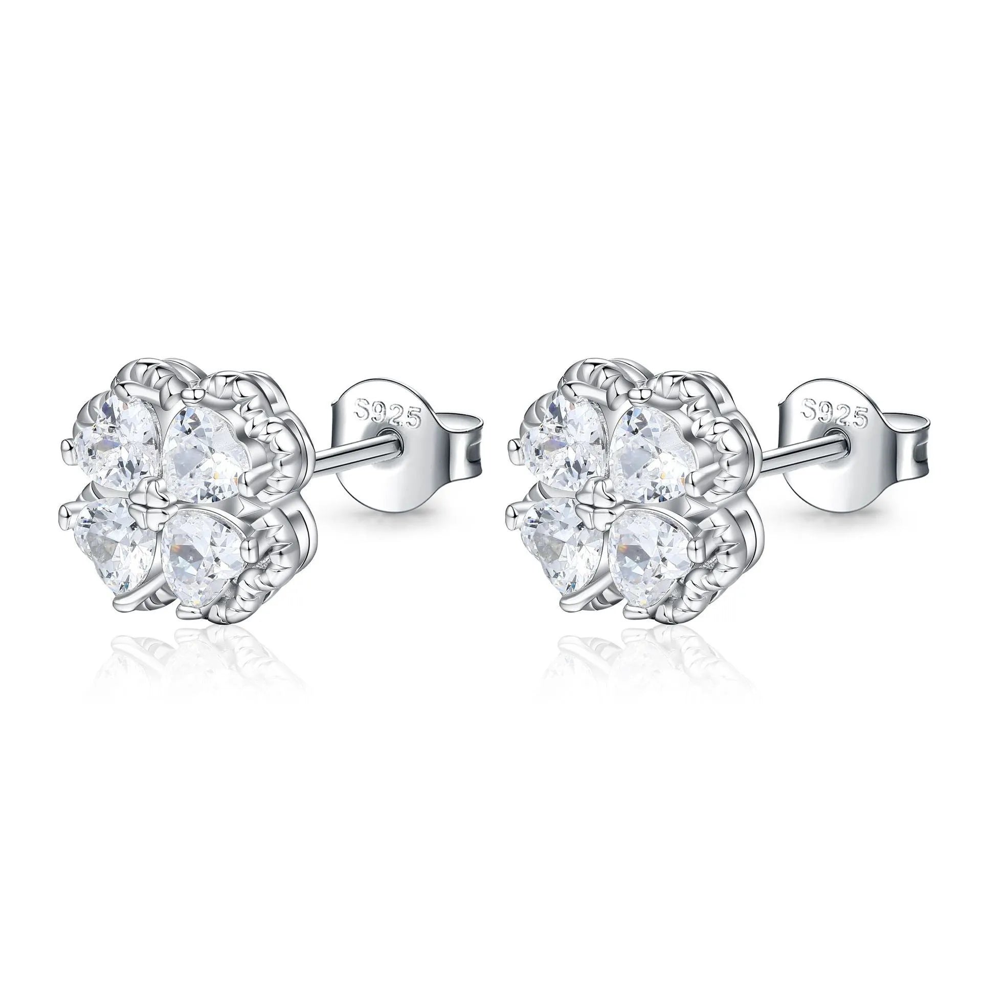 A pair of women's silver stud earrings with a four-leaf clover and heart design, white gold colour finish.