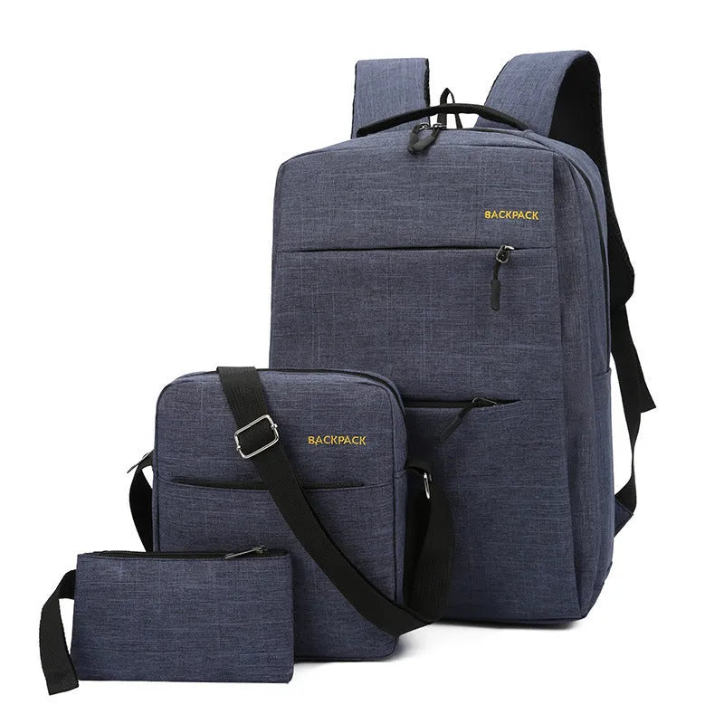 Three square men's backpacks in solid colours showing USB port, multiple compartments, and padded straps.