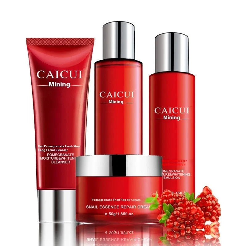 Red pomegranate skincare set with four bottles: face wash, toner, lotion, and facial cream.
