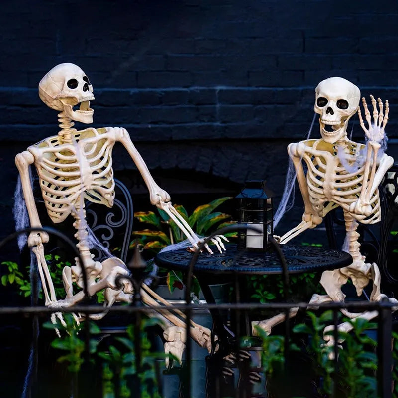 Poseable 90cm tall plastic skeleton Halloween decoration with articulated limbs.