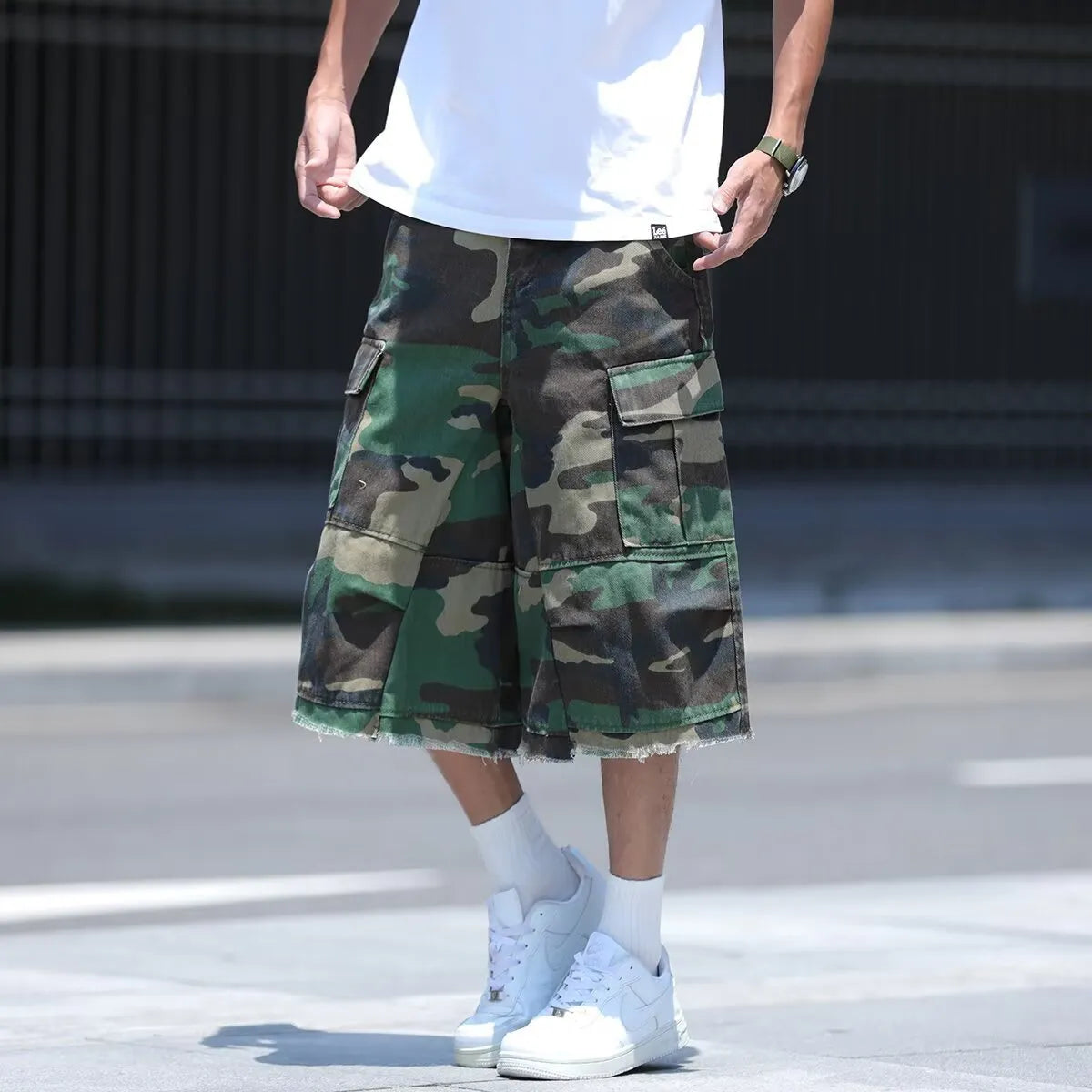 American retro workwear shorts in camouflage pattern with cotton construction and loose fit design