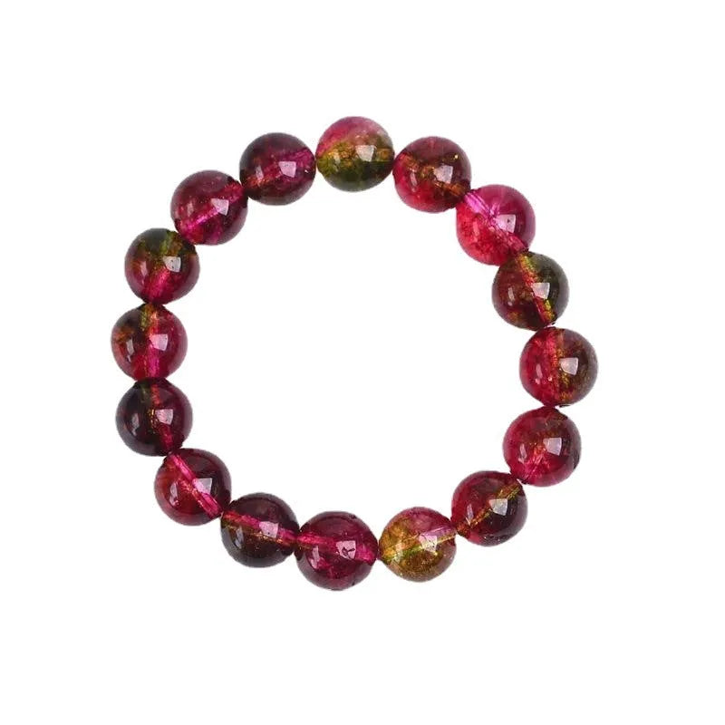 Handmade watermelon crystal bracelet showing natural colouration and bead detailing