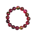 Handmade watermelon crystal bracelet showing natural colouration and bead detailing