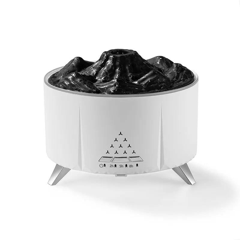 White flame aroma diffuser with Bluetooth speaker and remote control on a table