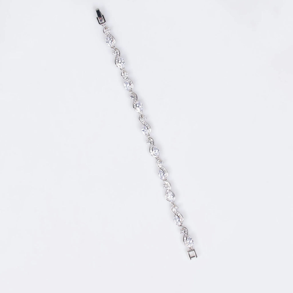 Zircon line bracelet in copper with geometric inlaid design, shown in blue or white for women