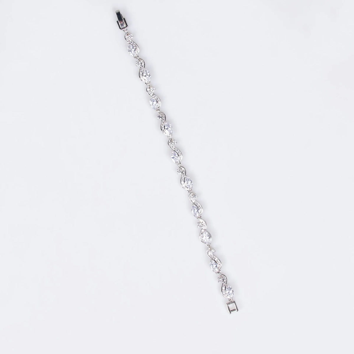 Zircon line bracelet in copper with geometric inlaid design, shown in blue or white for women