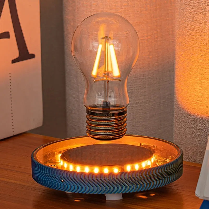 Modern magnetic levitation lamp with a 3D-printed spherical moon ornament floating above its base.