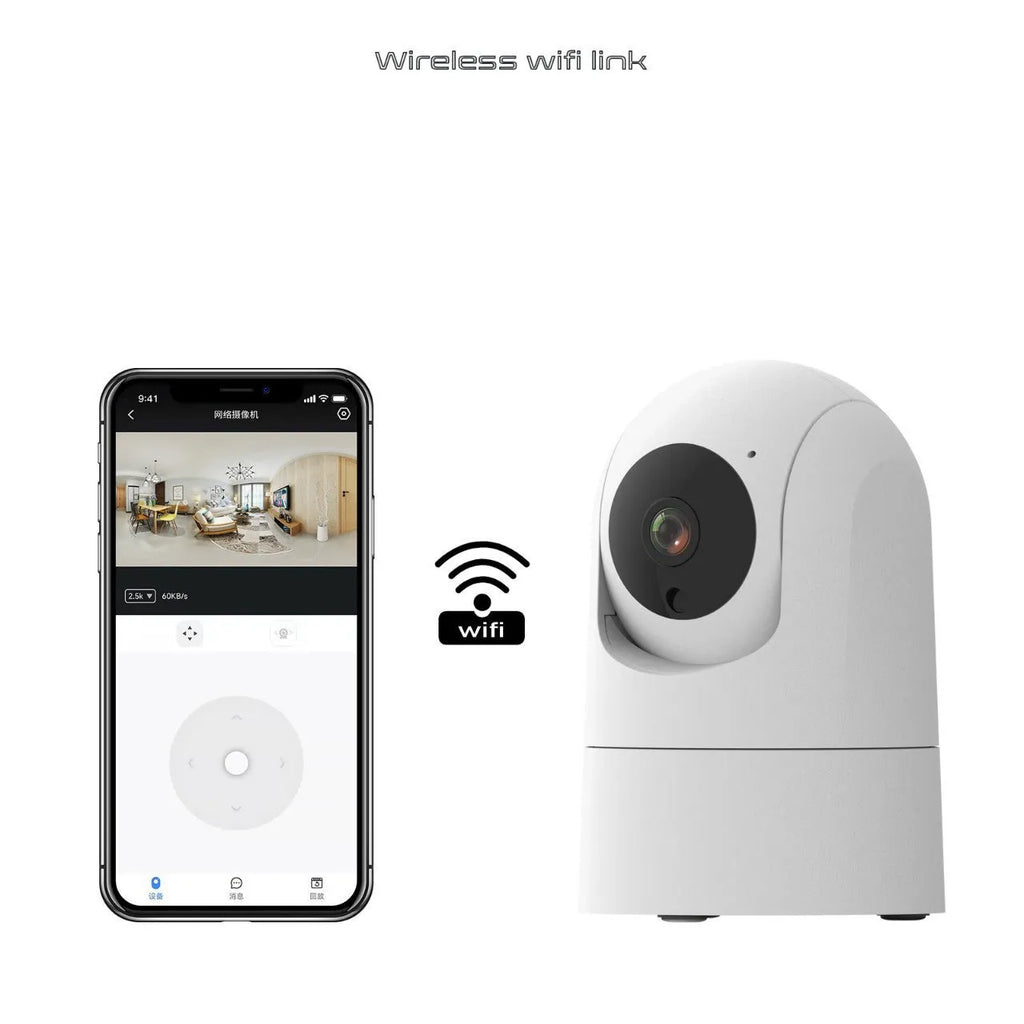 White indoor security camera with wide-angle lens on a table, showing power cable and mounting bracket.