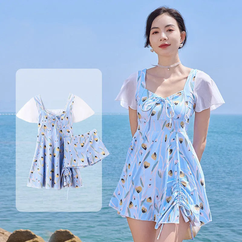 Women's floral one-piece swimsuit in Sea Salt Blue colour on a mannequin