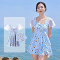 Women's floral one-piece swimsuit in Sea Salt Blue colour on a mannequin