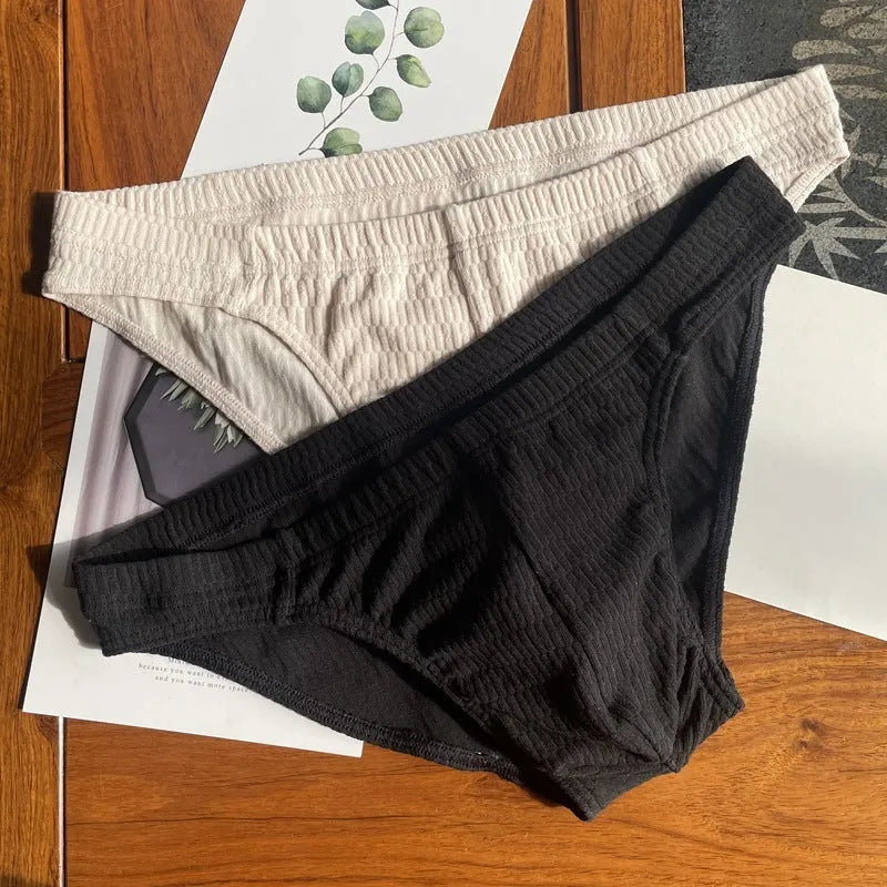 Men's solid colour cotton triangle underwear briefs showing mid waist design and available colour options
