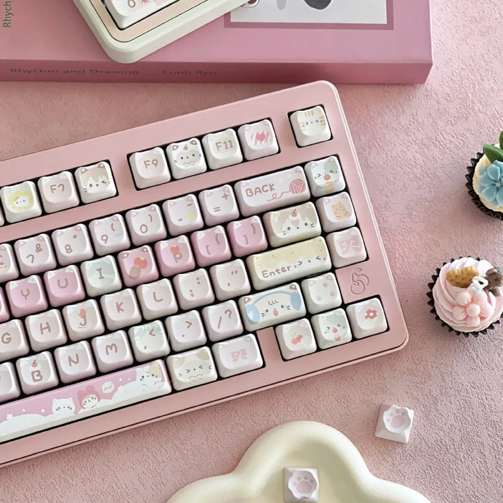 Meow Meow Team mechanical keyboard key cap set showing 141 keys with feline character artwork on all sides