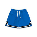 Men's loose-fit polyester sports shorts in various colours including black, Klein blue, and apricot.