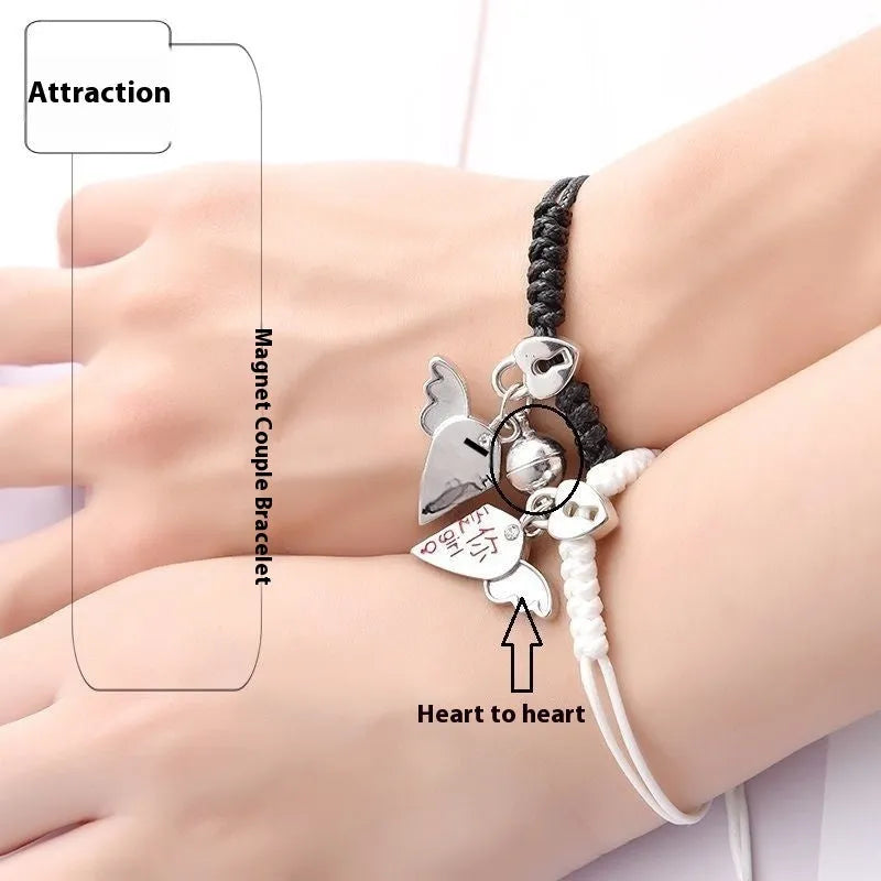 Magnetic couple bracelet pair in alloy with electroplated finish showing I love you design and crown style options