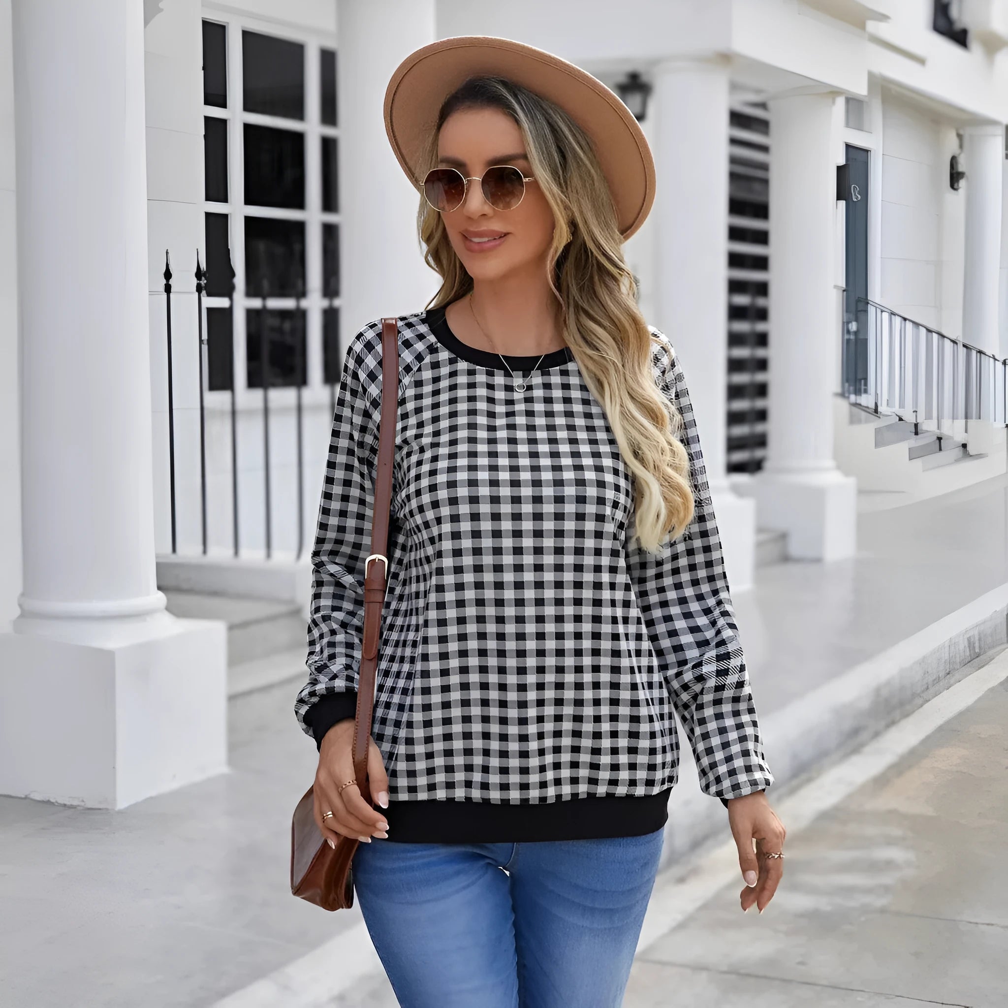 Black long sleeve pullover sweater with a Japanese sweet plaid and striped pattern.