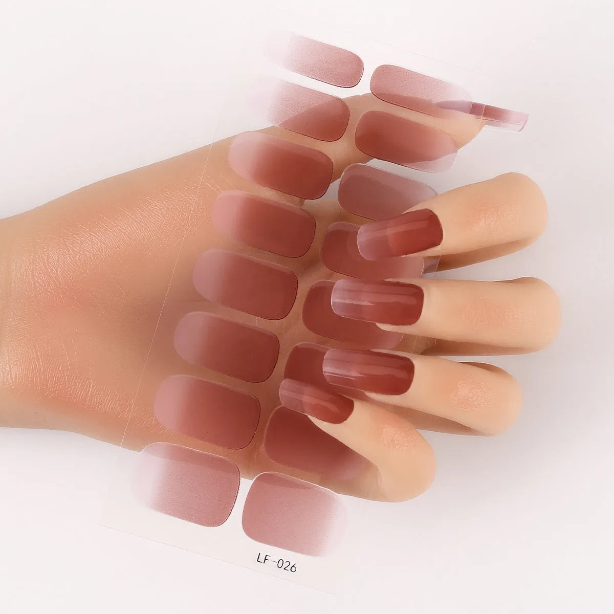 16 solid colour full nail art stickers with 22 patterns including cross, rose, butterfly designs in 12x6mm oval size