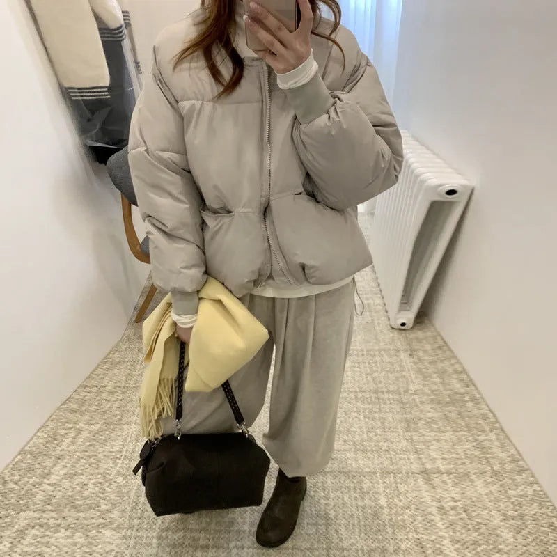 Gray loose short down jacket for women plus size with pocket details, solid colour