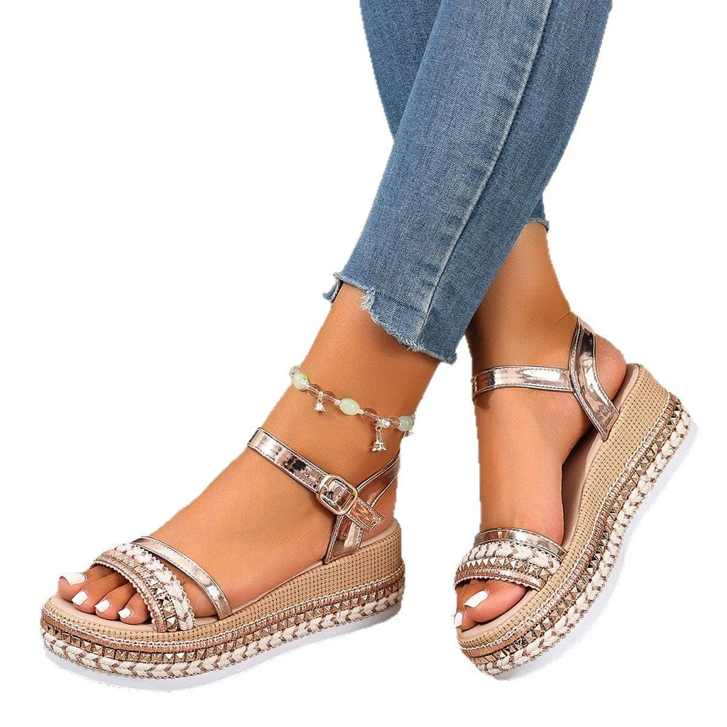 Gold women's wedge sandals with woven upper and round toe