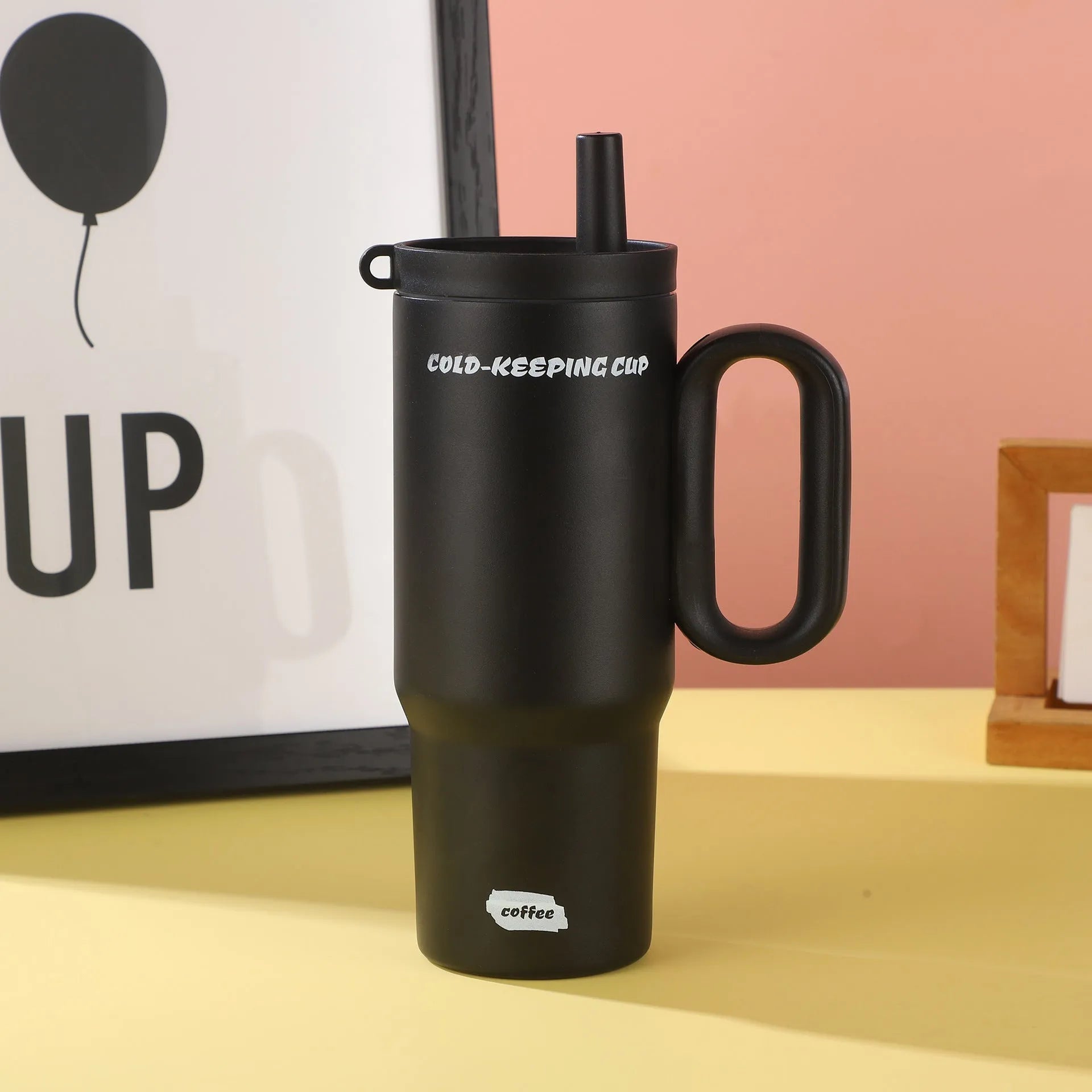 Portable large capacity insulated drink cup with handle in multiple colour options.