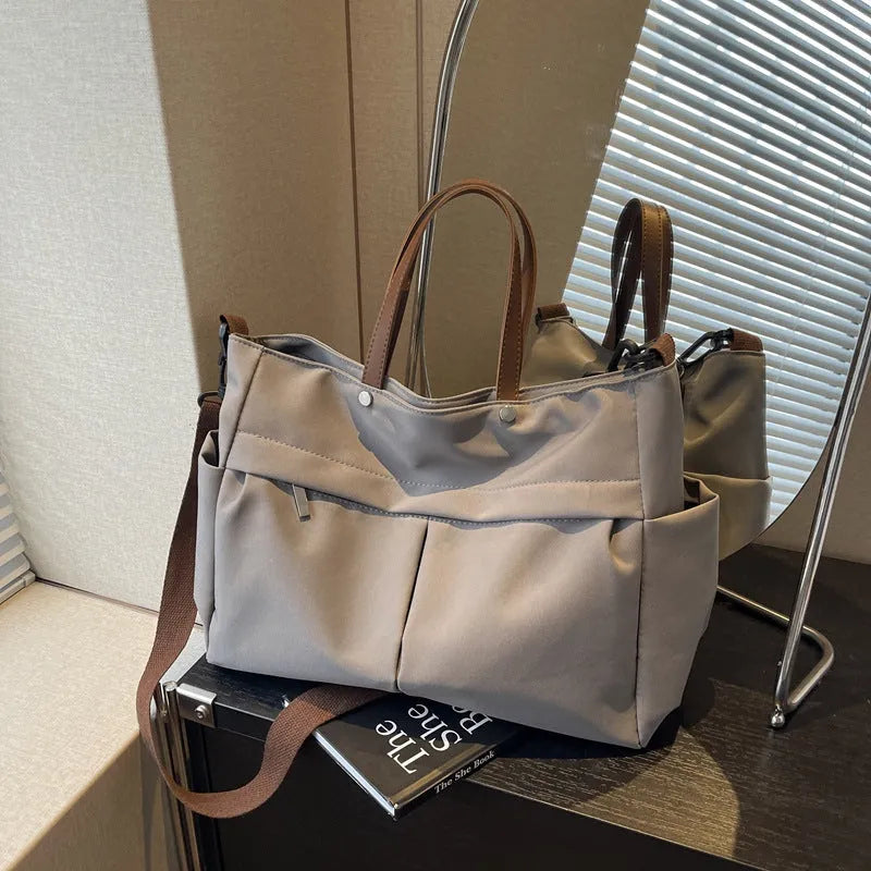 Nylon crossbody tote bag in black colour with shoulder strap