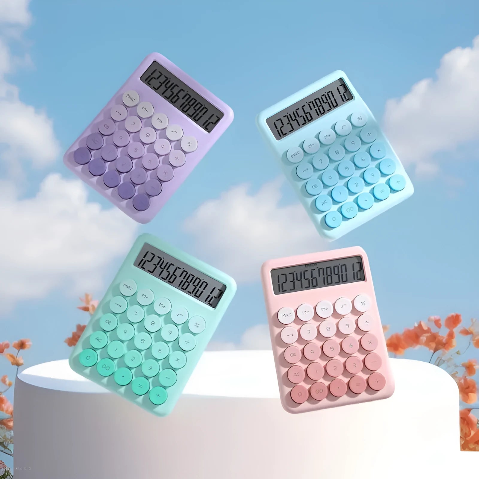 Gradient colour desk calculator in violet, cherry blossom pink, light blue or mint green.