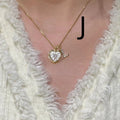 Women's pendant necklace with titanium steel chain and natural mother-of-pearl in heart-shaped design