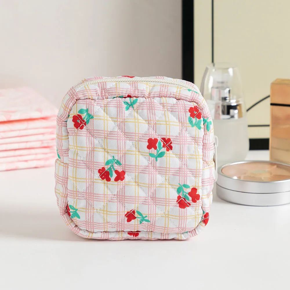 Floral pattern key storage bag made from breathable polyester fabric in various colour options.