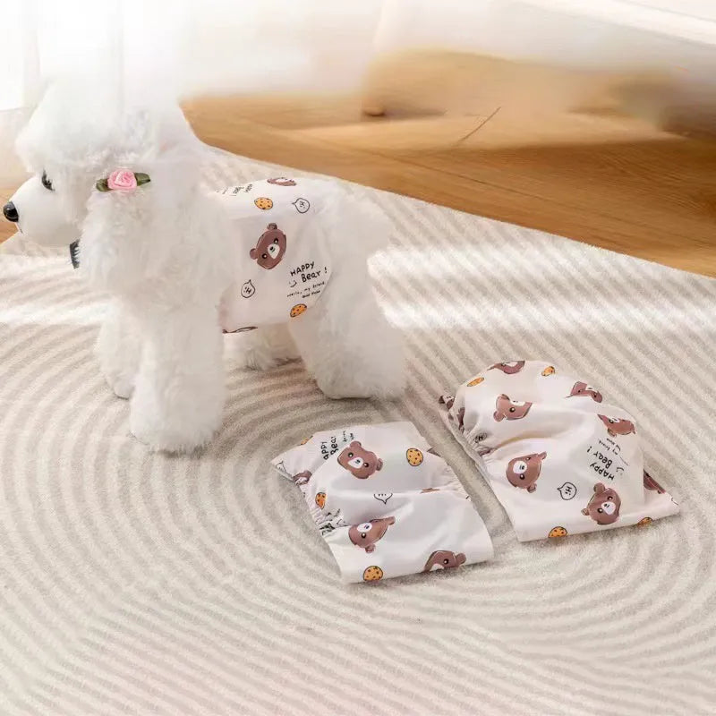 Reusable cartoon bone print dog diaper with fastener tape and elastic waistband, shown in blue bear pattern.