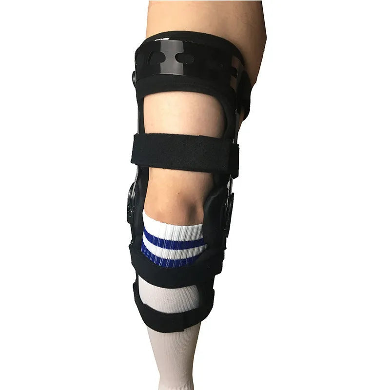 Black anterior ligament knee pad supporter shown with left and right leg size tags.